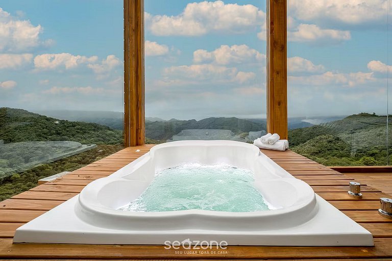 Linda cabana com jacuzzi na montanha VST013